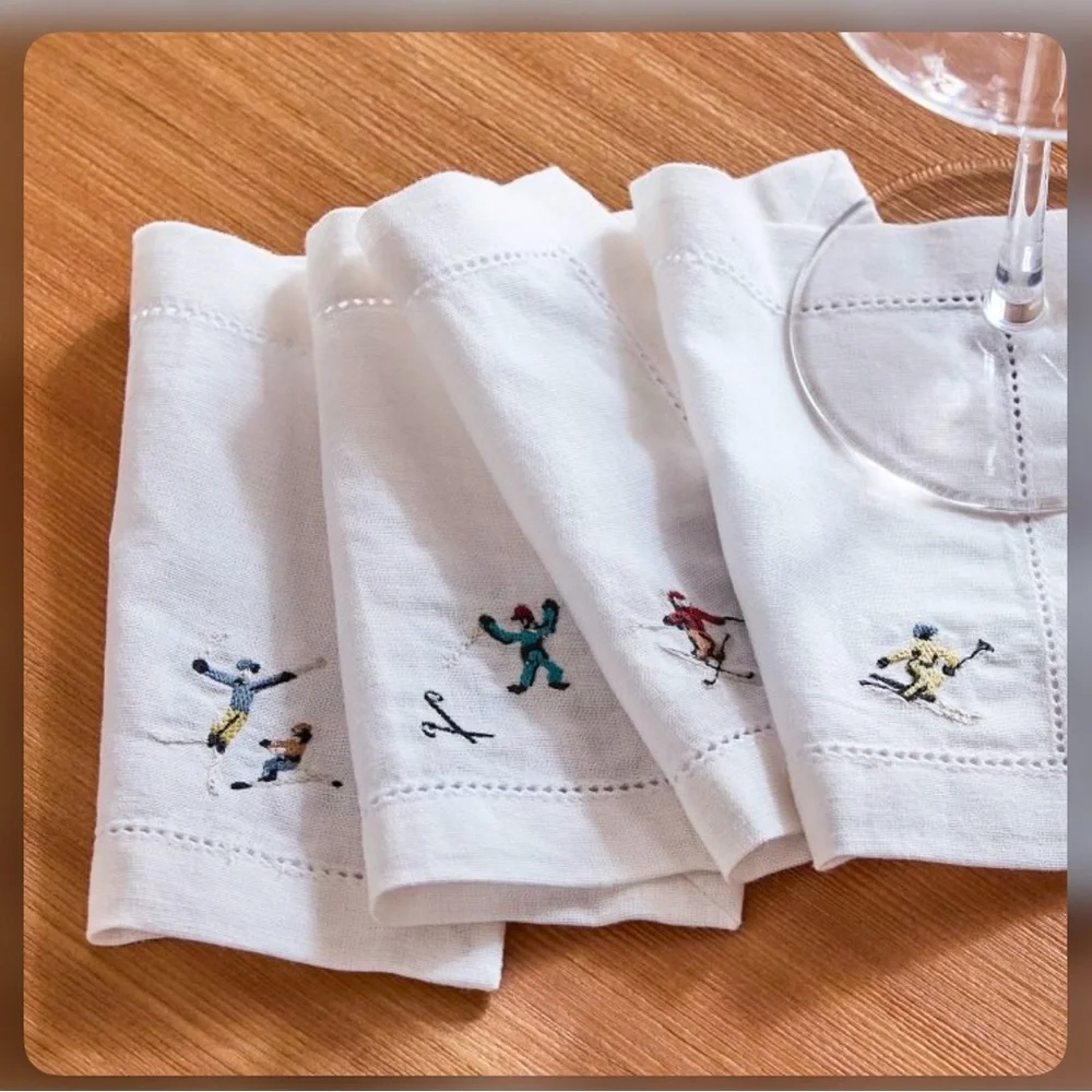 West Elm (St . Jude) Holiday skiers Embroidered Cocktail Napkins set